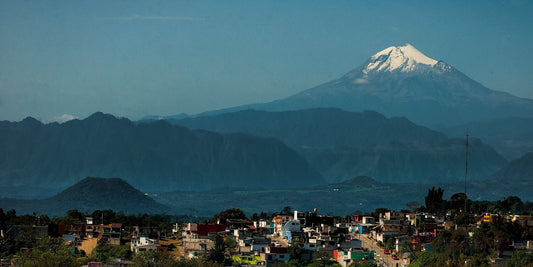 Snow-capped Pico de Orizaba rising over the coffee highlands near Xalapa, Veracruz, Mexico